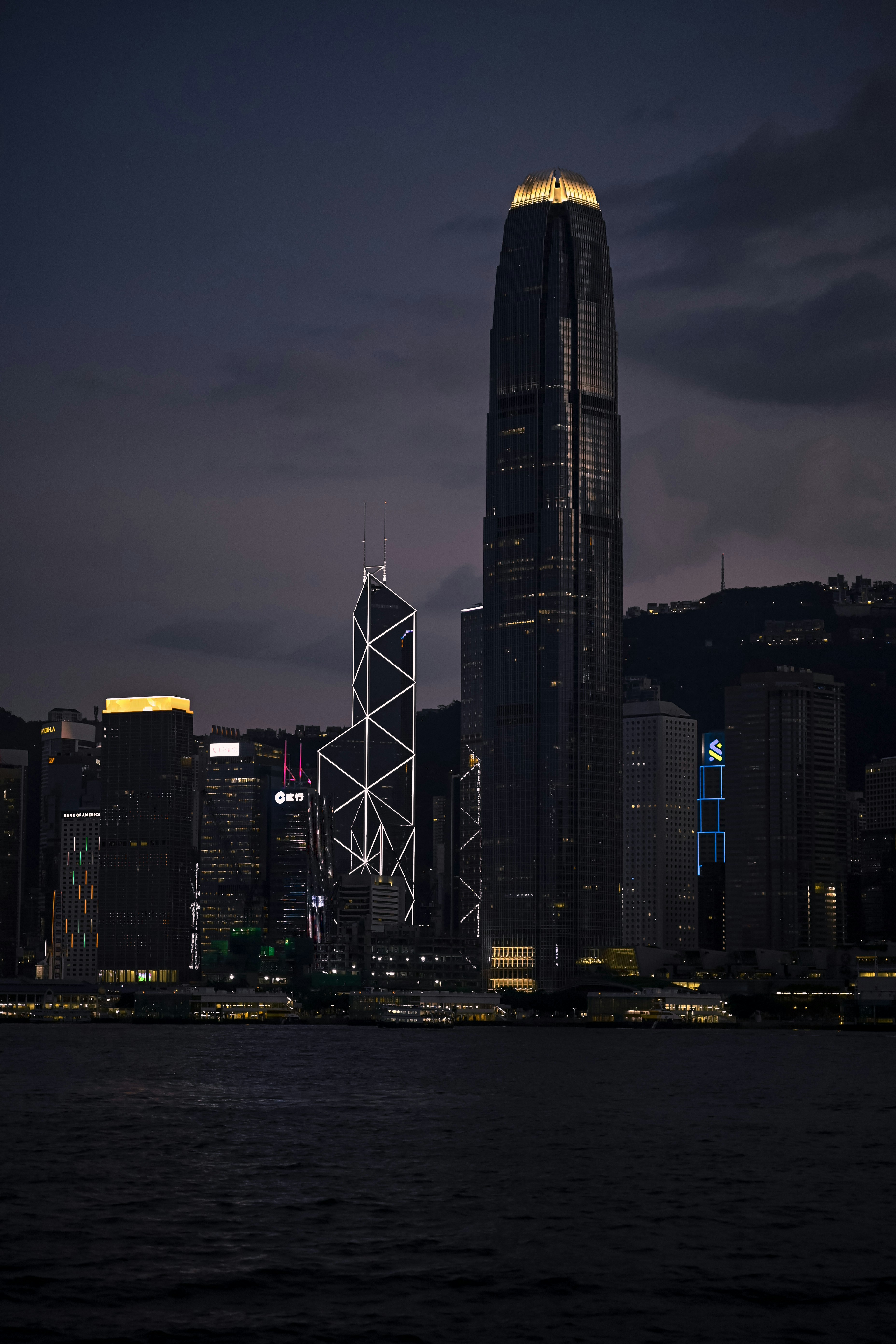 City skyline with illuminated skyscrapers at night