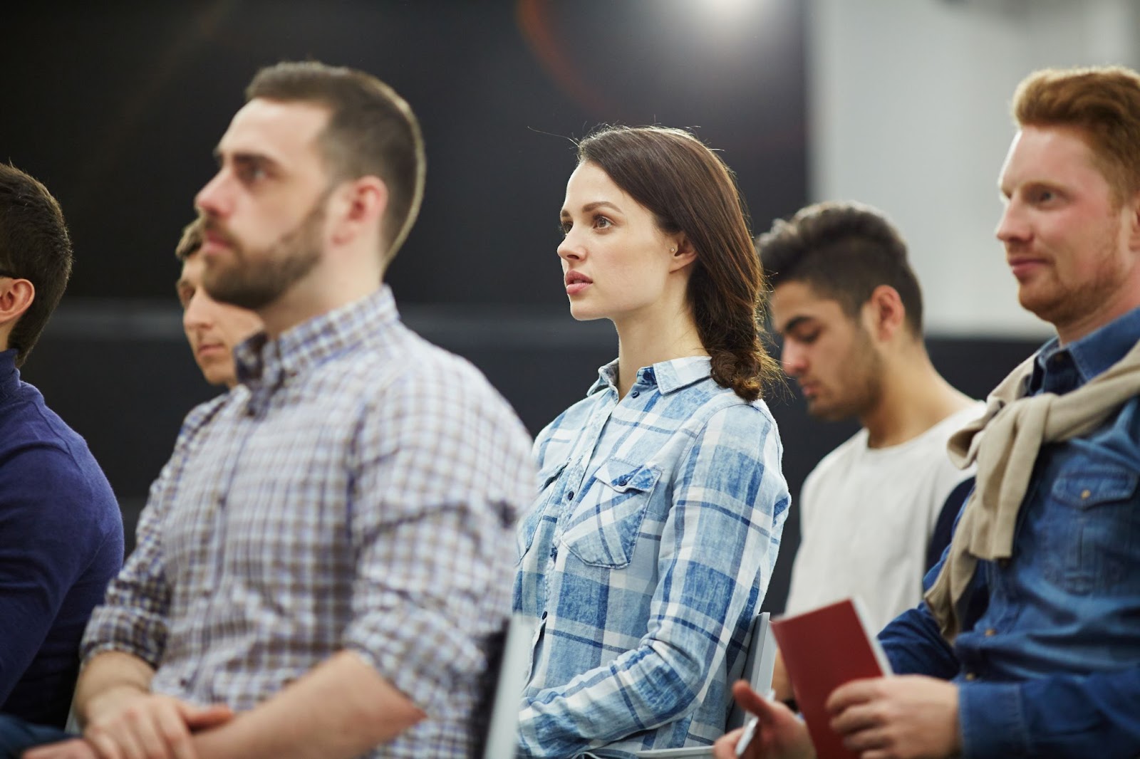 Attendees listening during a networking event