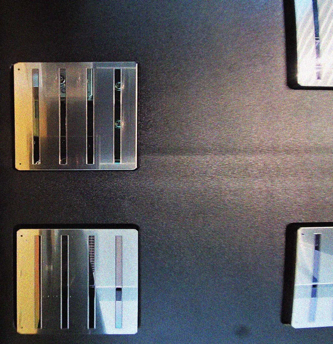 Internal nozzle inspection viewpoint of the Manprotek Gravity Pro DTF printer, showing the precision-aligned print head components for quality control.