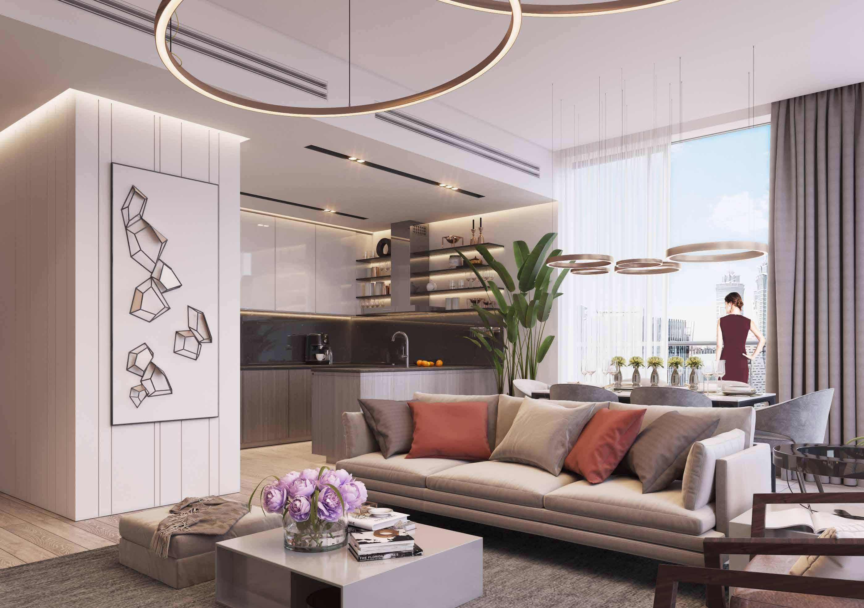 Luxury living area with an open-plan kitchen and stylish furniture, ideal for modern urban living.