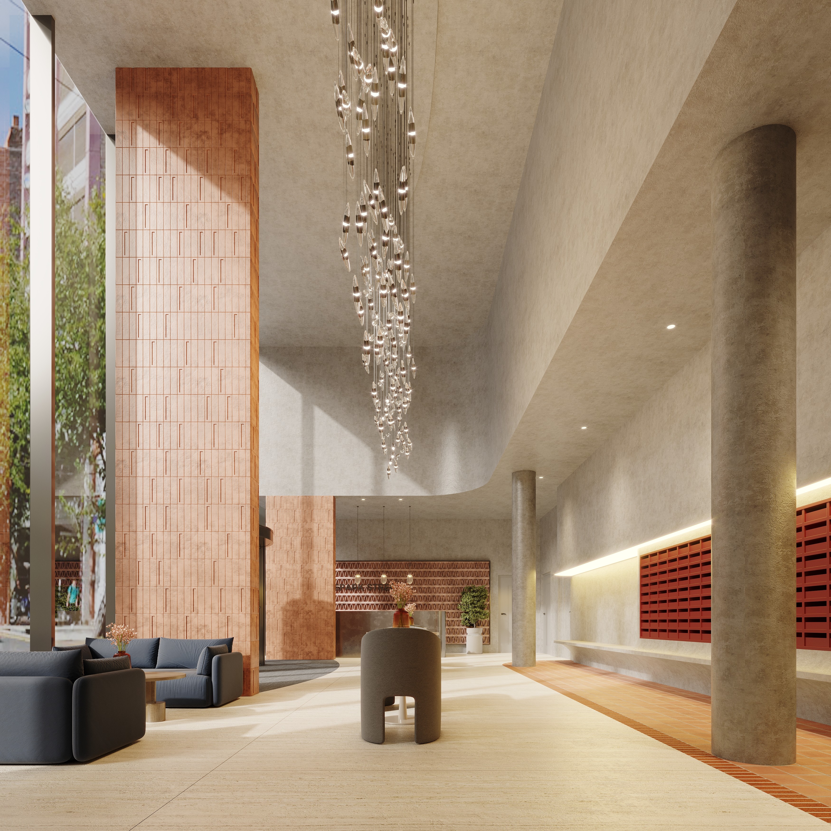 Luxury reception at PBSA development with bespoke reception desk and postboxes, statement chandelier and modern furniture