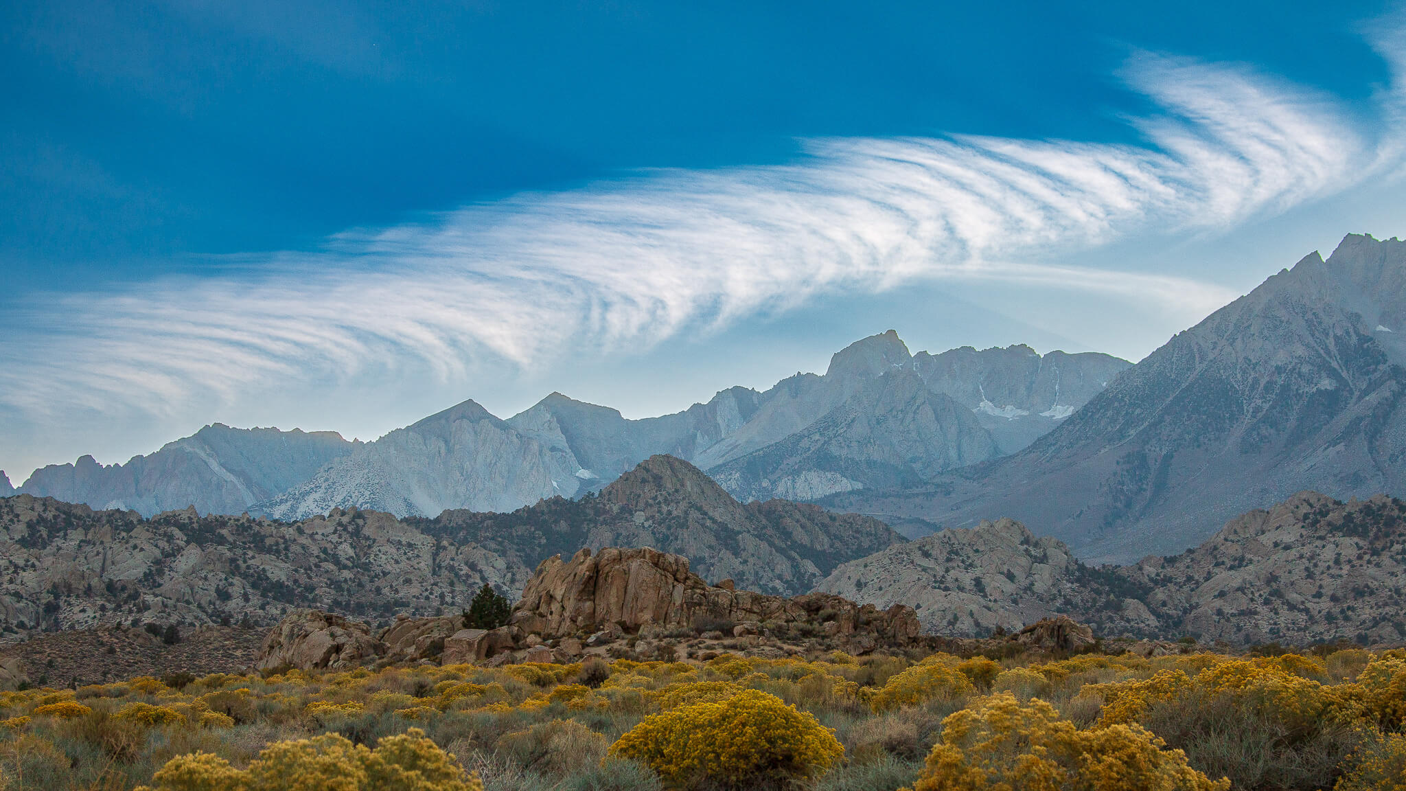 clouds in the wind over the mountains
