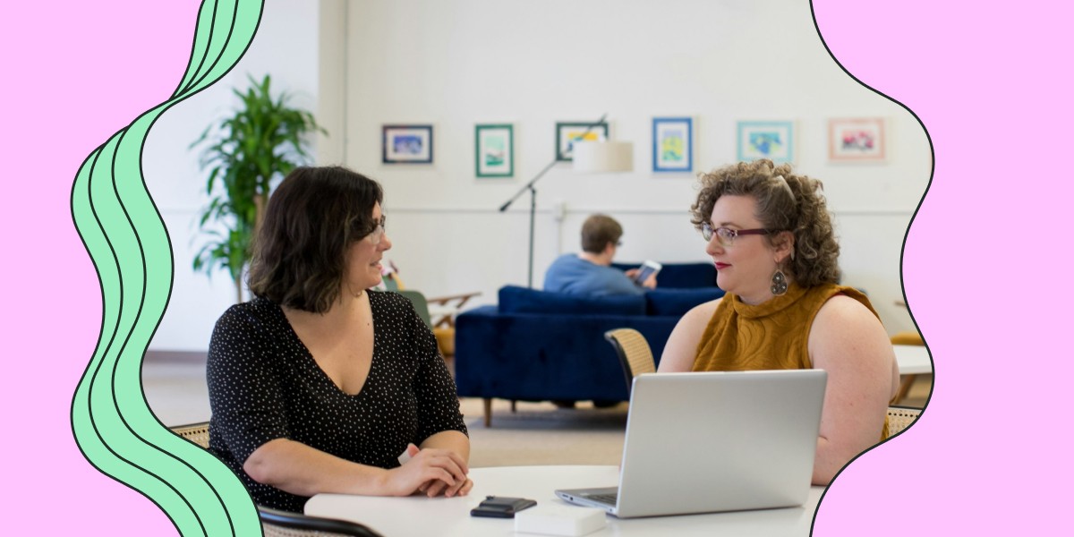 Two women in a casual setting discussing mentorship, symbolizing a nurse mentor providing guidance and career advice.