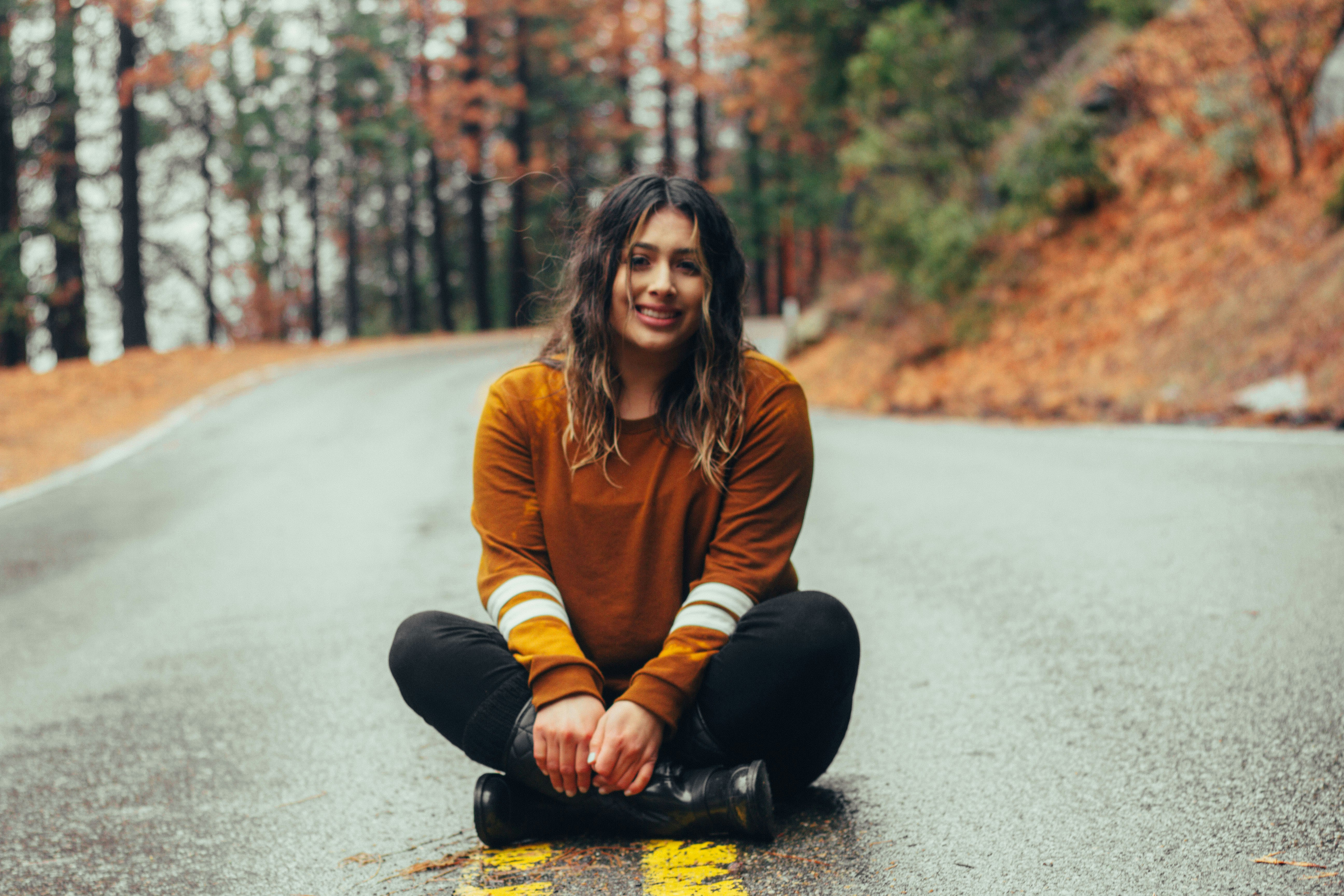 woman sitting on road - Deep Autumn Color Analysis