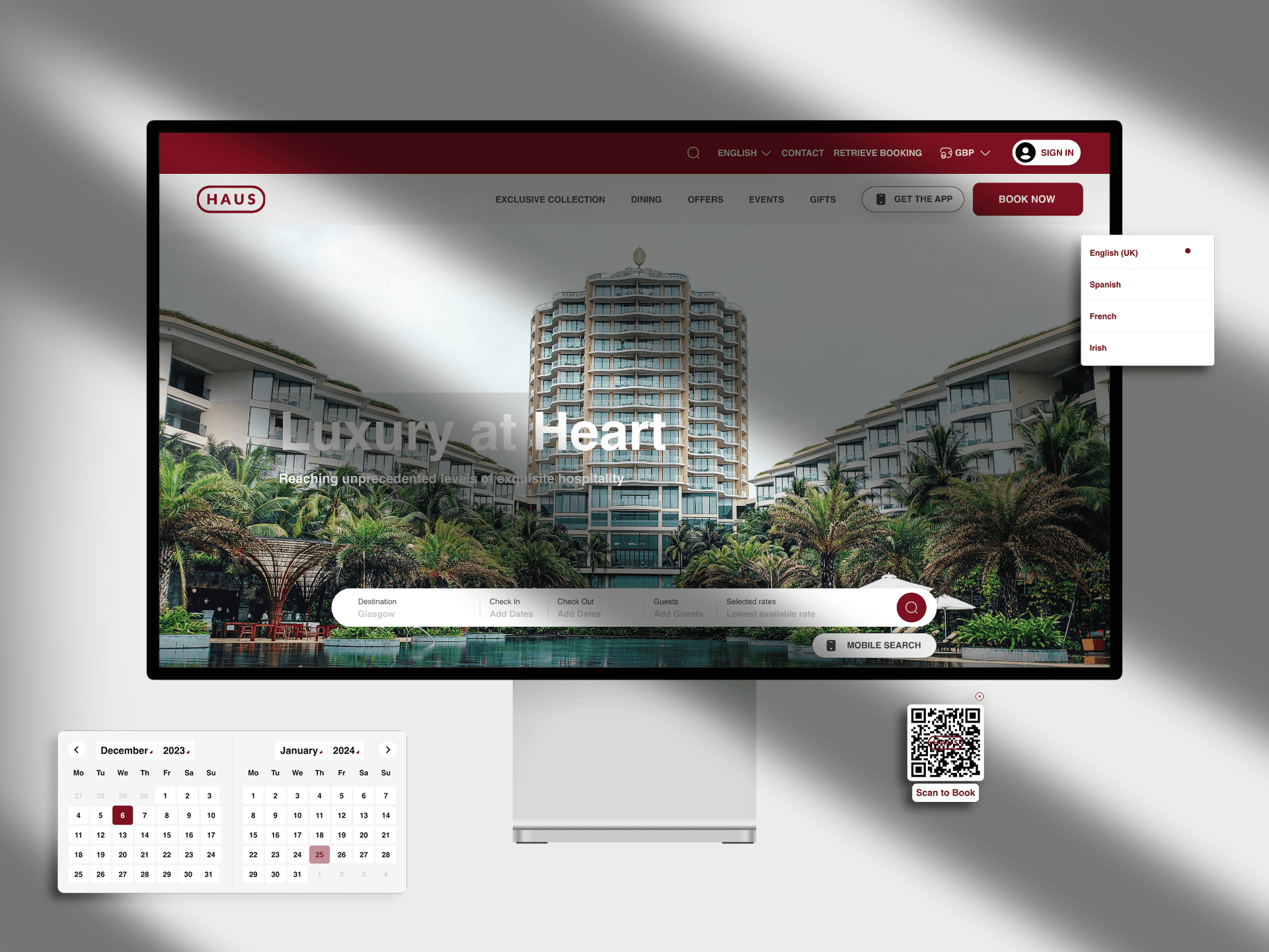 A monitor showing a hotel website