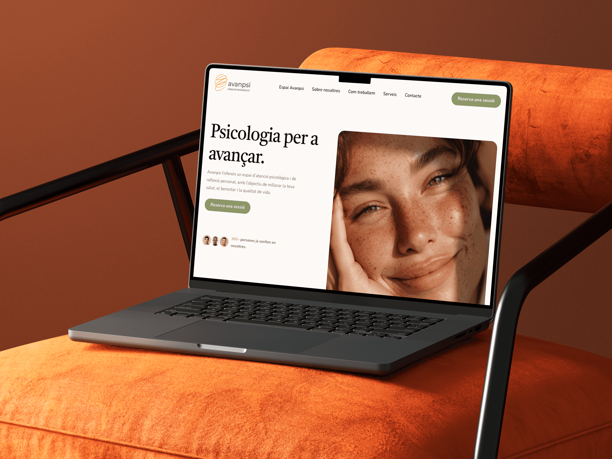 Laptop screen showing the Avanpsi psychology clinic website design with soft orange tones and clean, modern layout