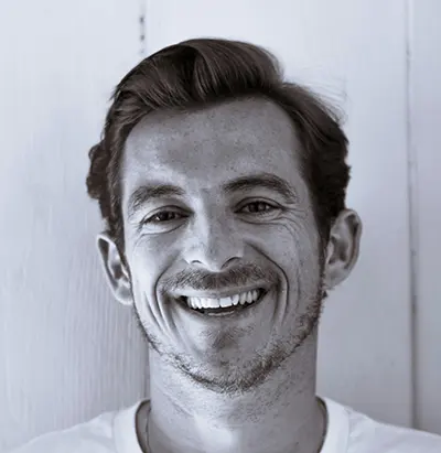 Man smiling, close-up portrait