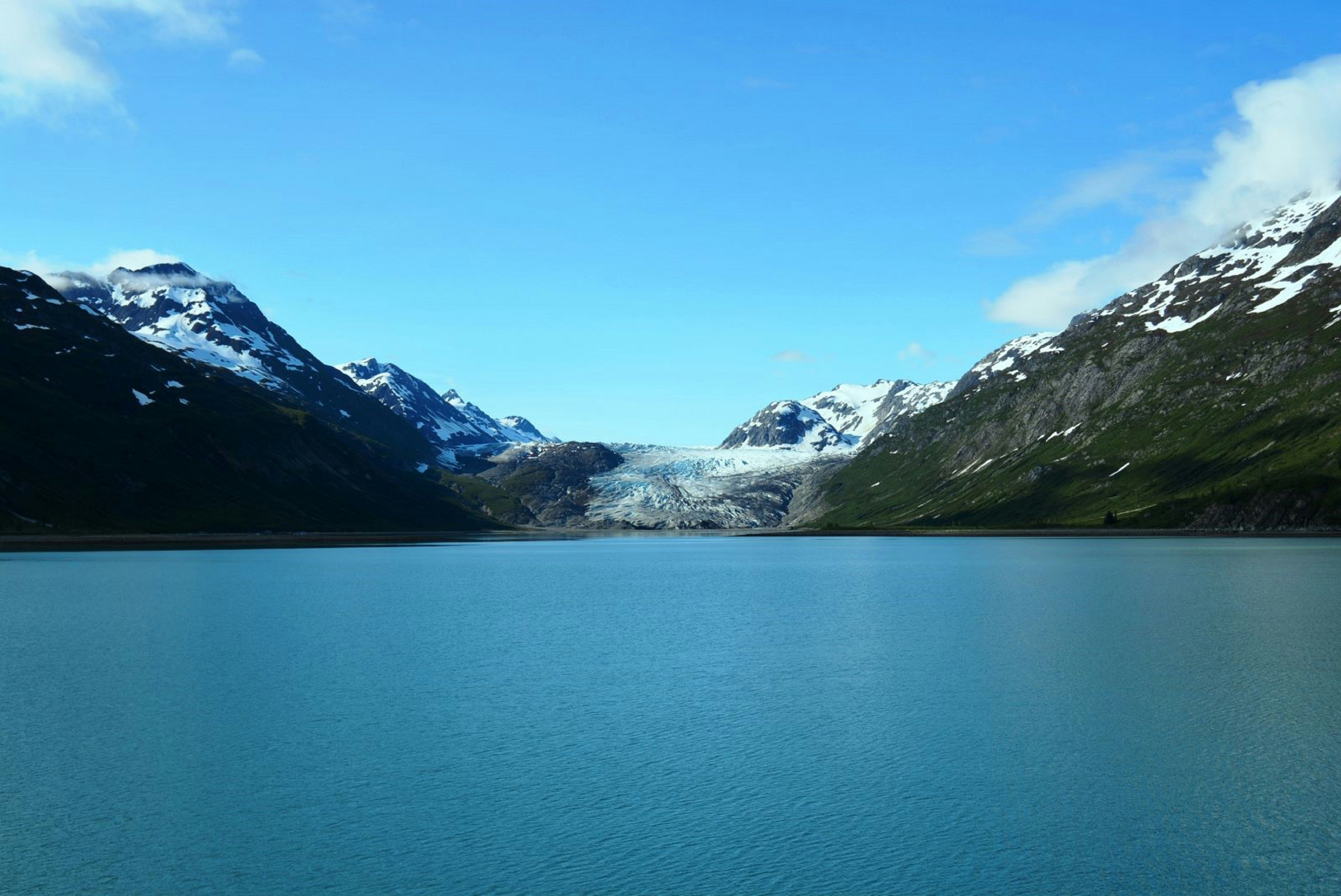 a large body of water surrounded by mountains