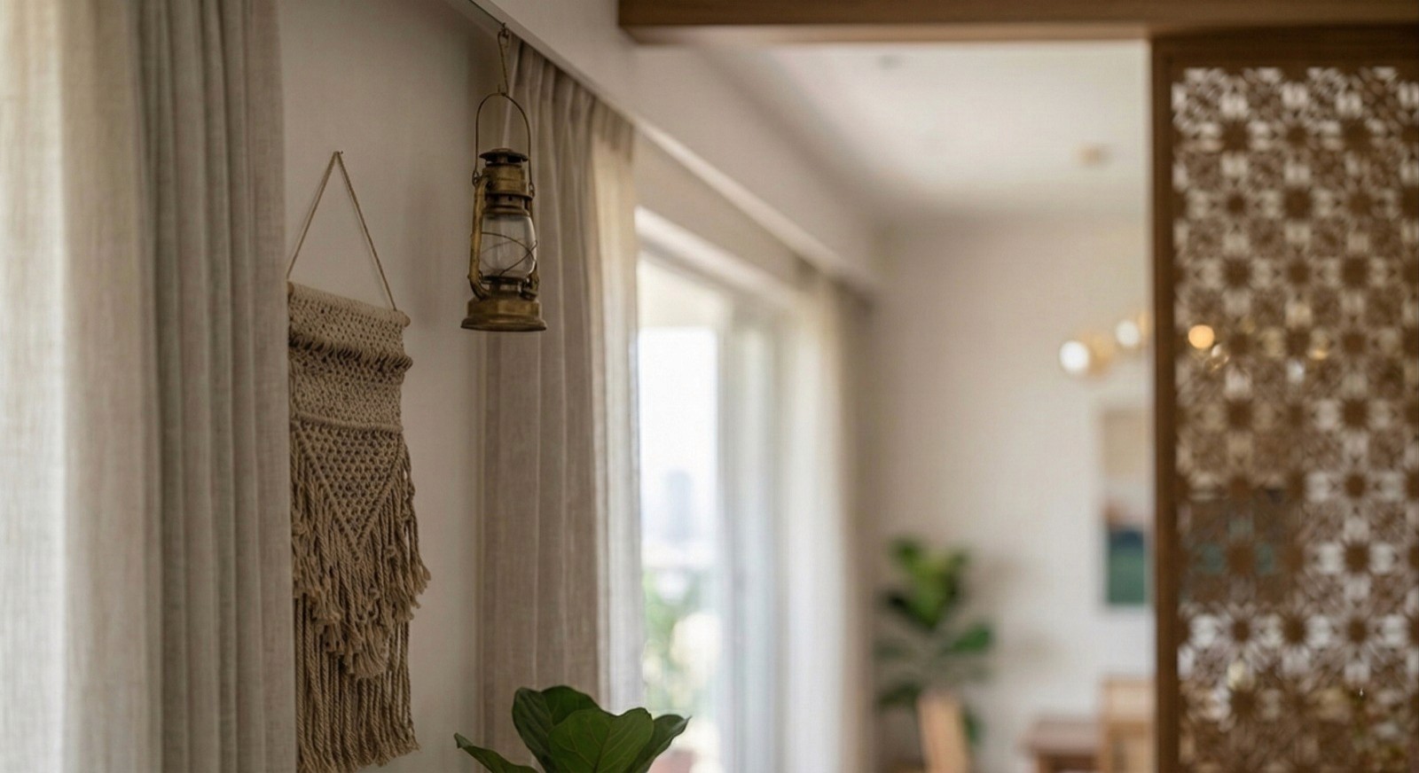 Vintage-modern living room with tufted sofas, false ceiling, and layered warm lighting.