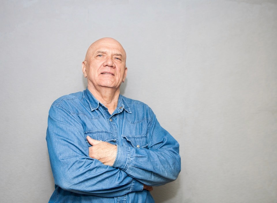 a man with his arms crossed