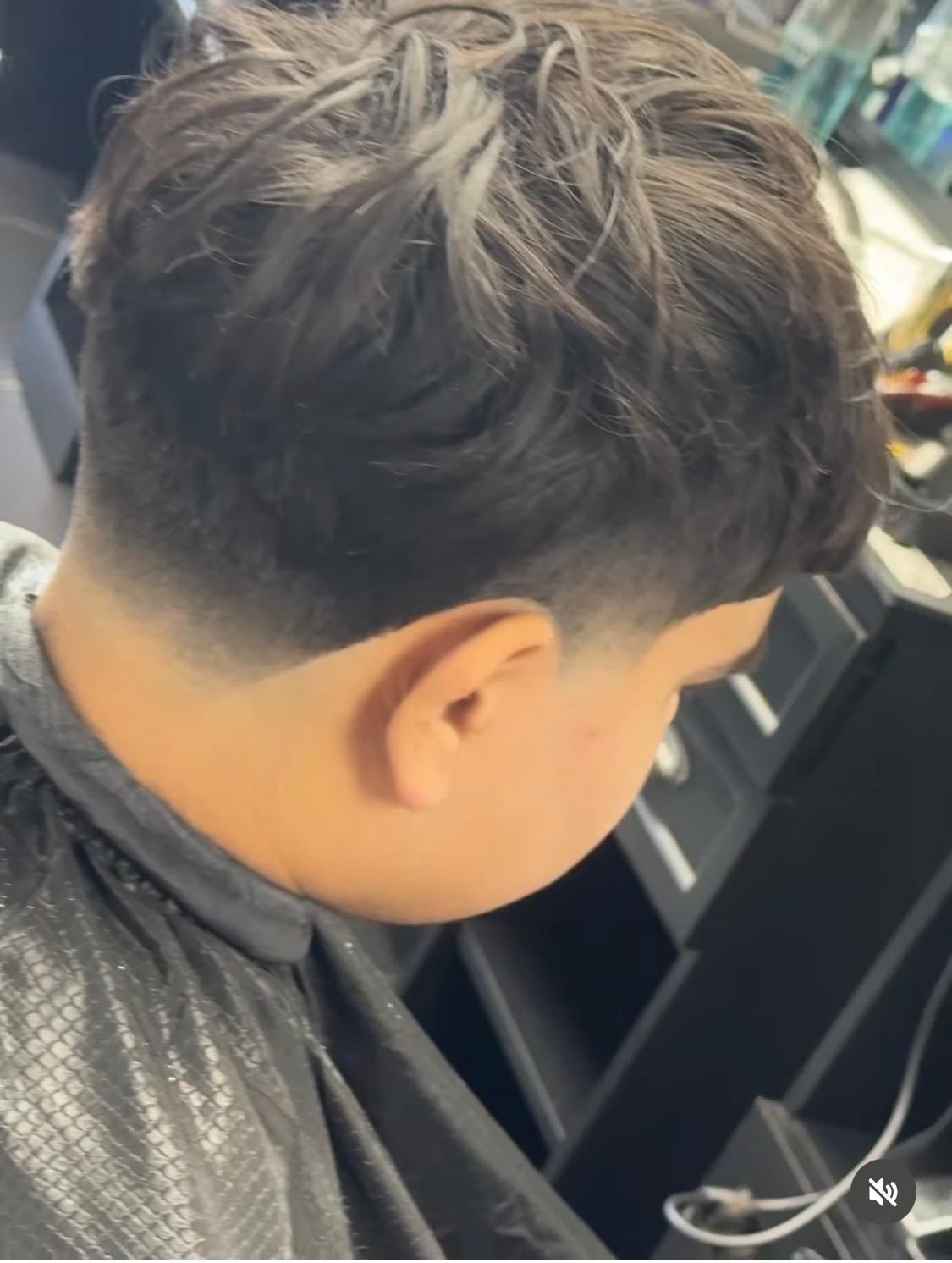 Barber attending client