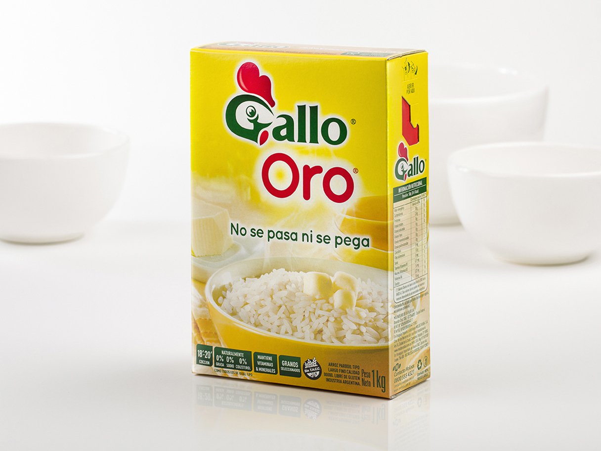 Rooftops of a coastal town with the sea in background