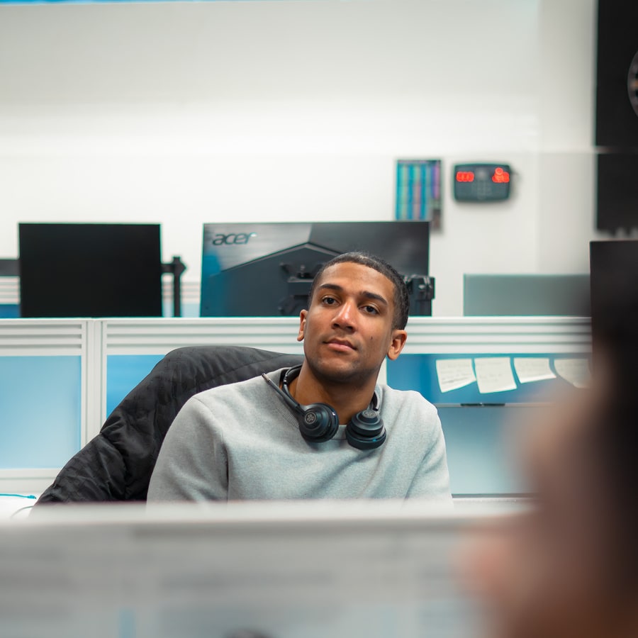 A PSS Tax adviser at their desk in the Manchester office