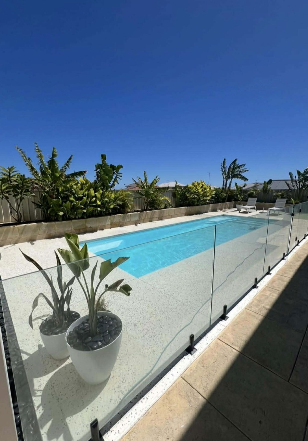 Electrician drilling in a wall