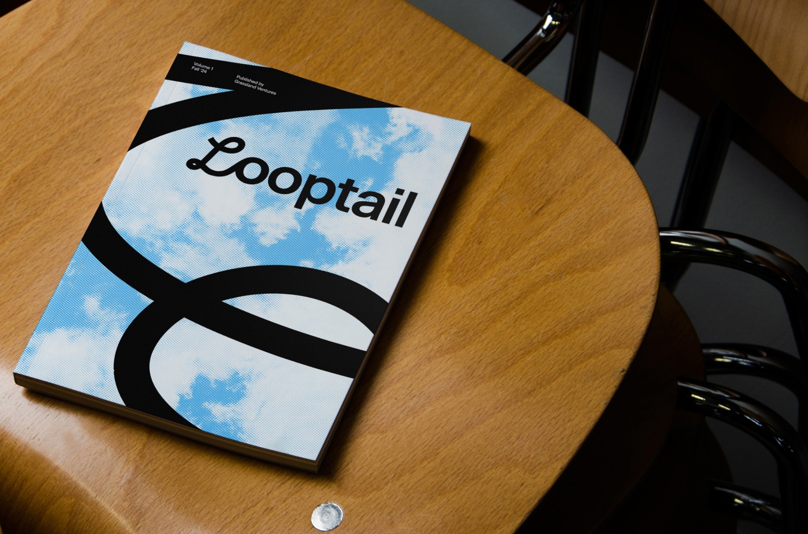 Looptail magazine placed on a chair