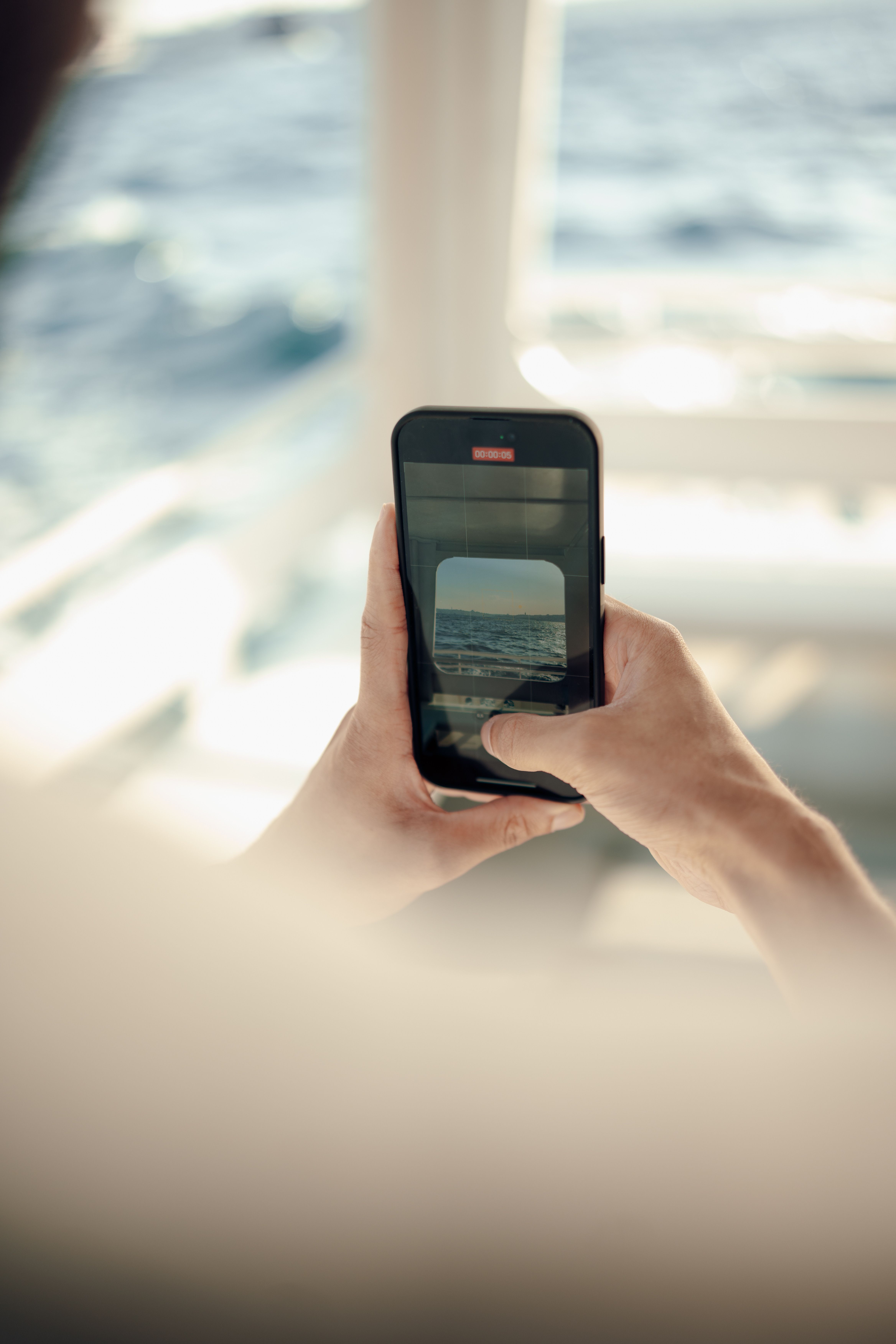 smartphone taking photo on acruise thoru