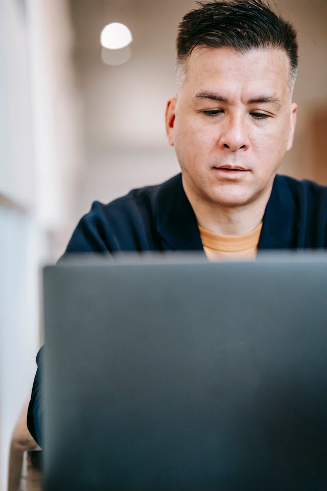 man using his laptop