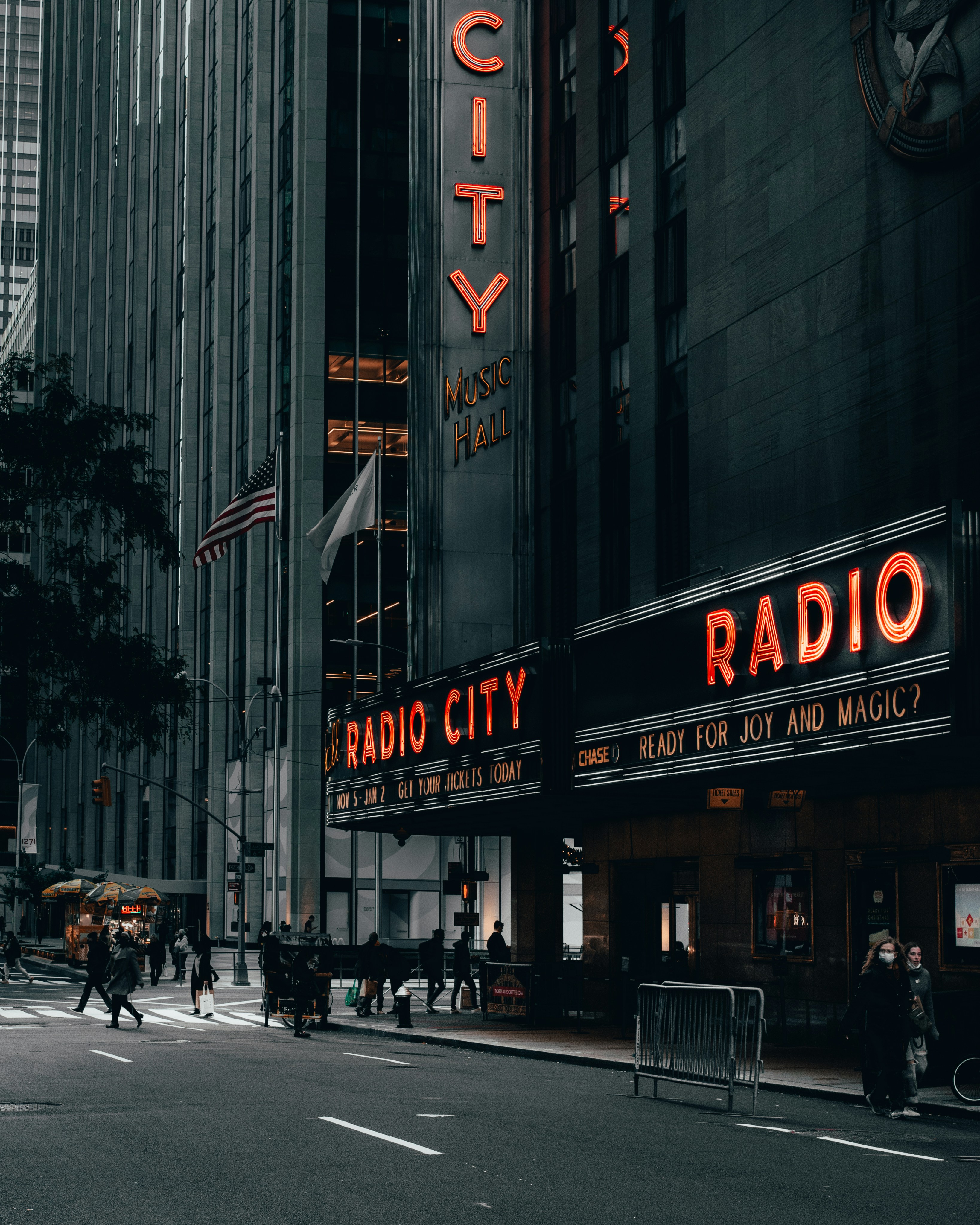 the radio city radio city sign is lit up