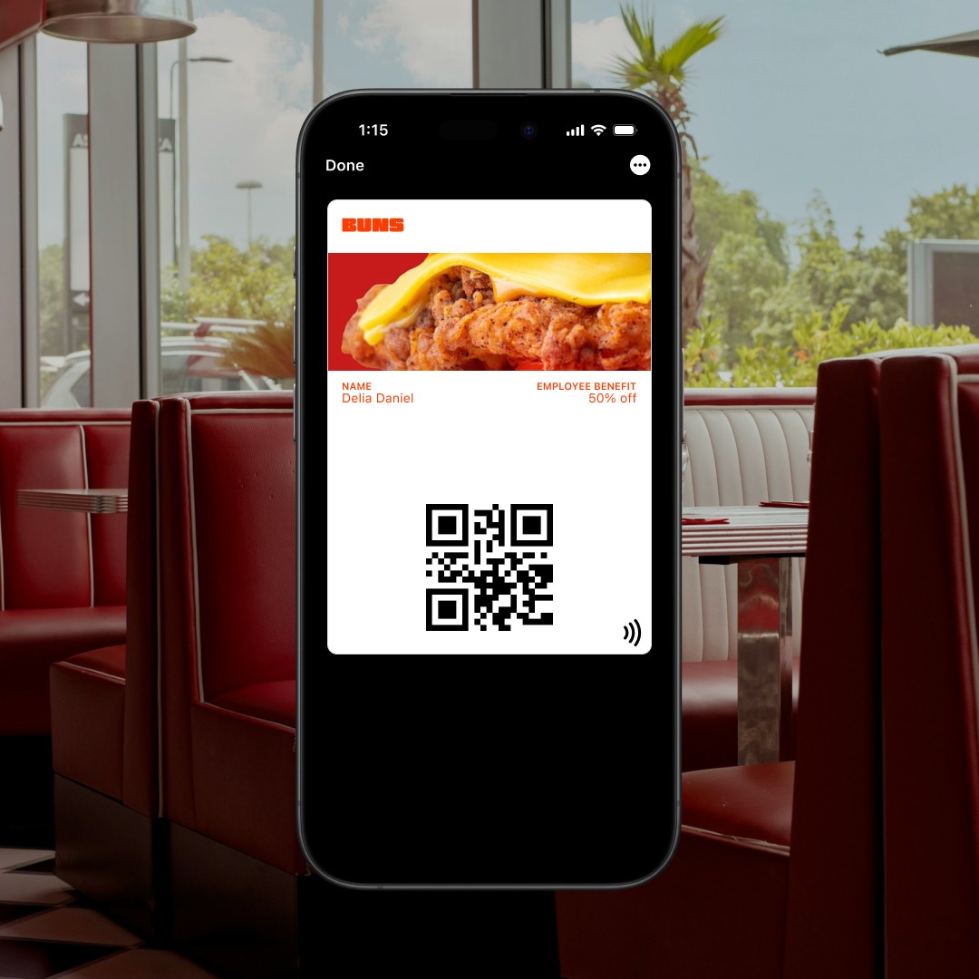 lady checking her phone and smiling