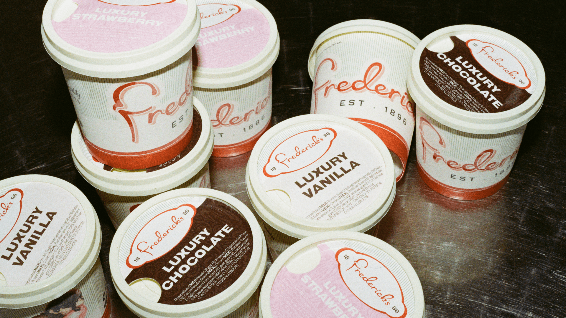 Minimalist coffee can design in hand – black and white packaging with bold typography