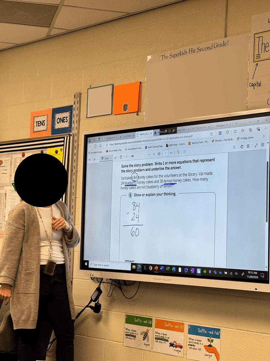 Classroom observation: a teacher using the Student Edition PDF during a lesson.