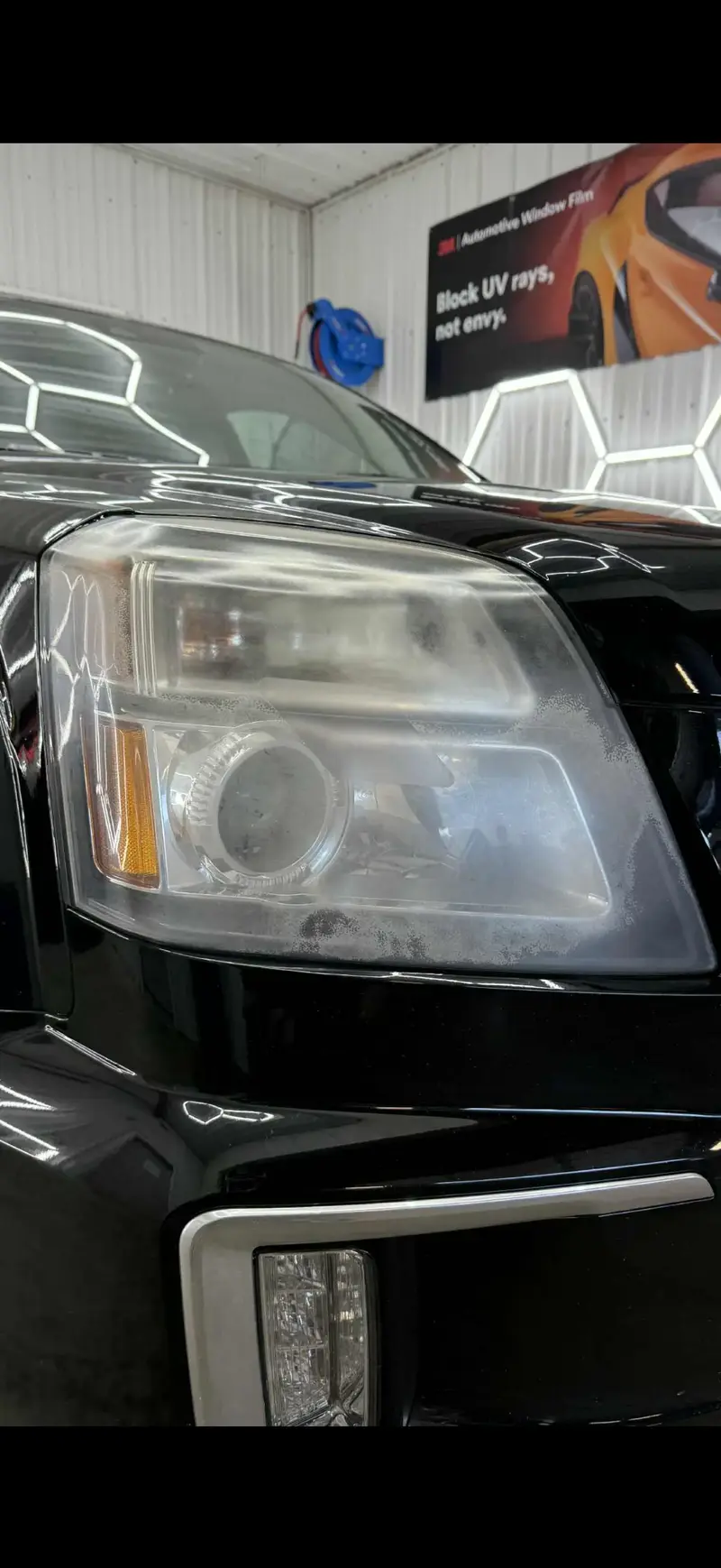 black car with old headlight