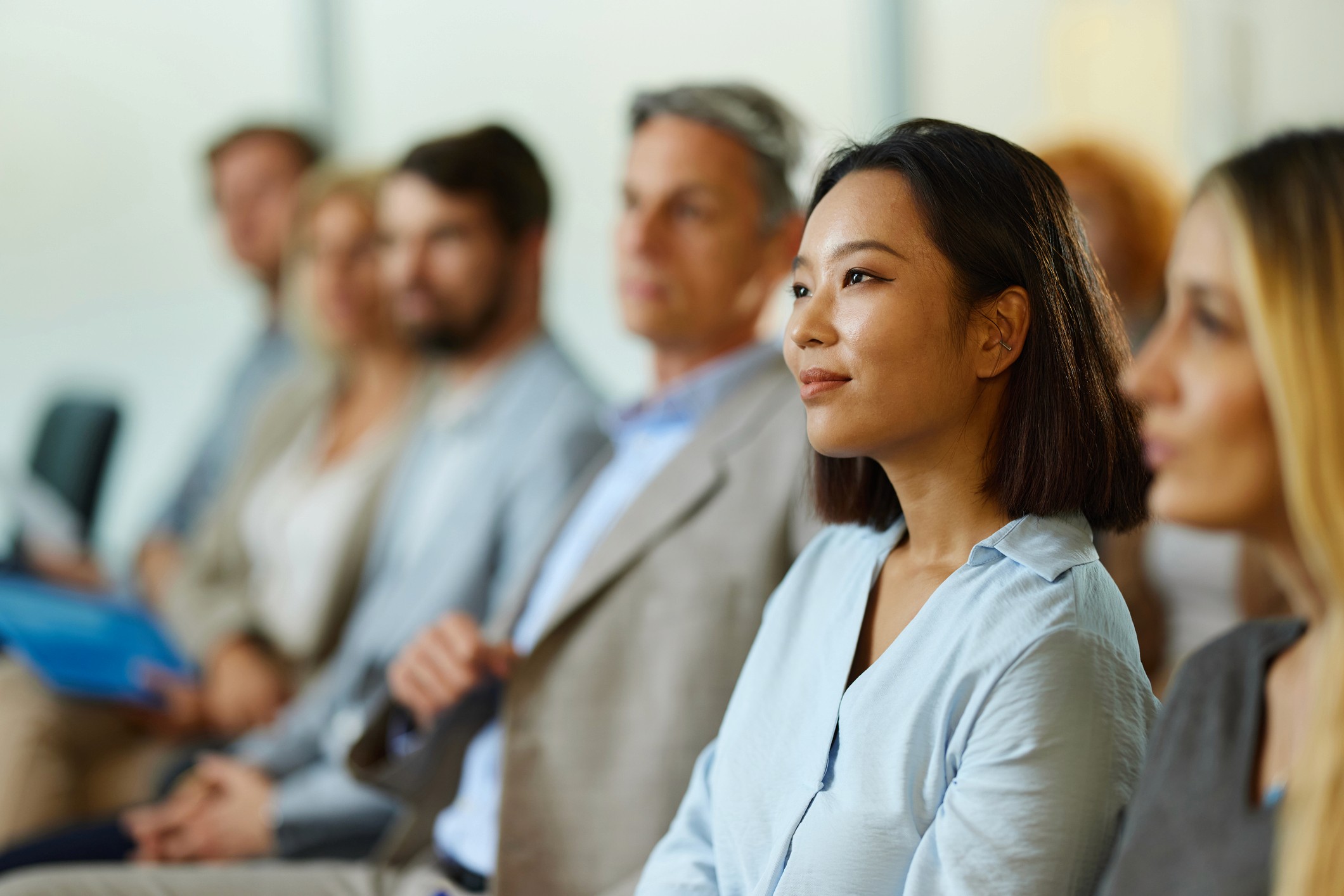 Woman sitting in audience