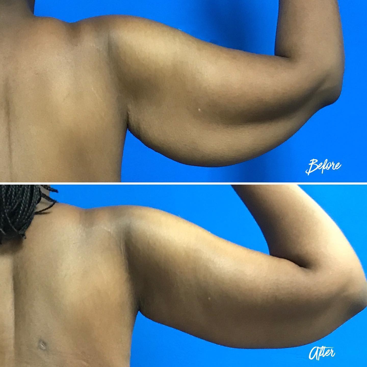 The sun peaking through a rocky arch formation at sunset