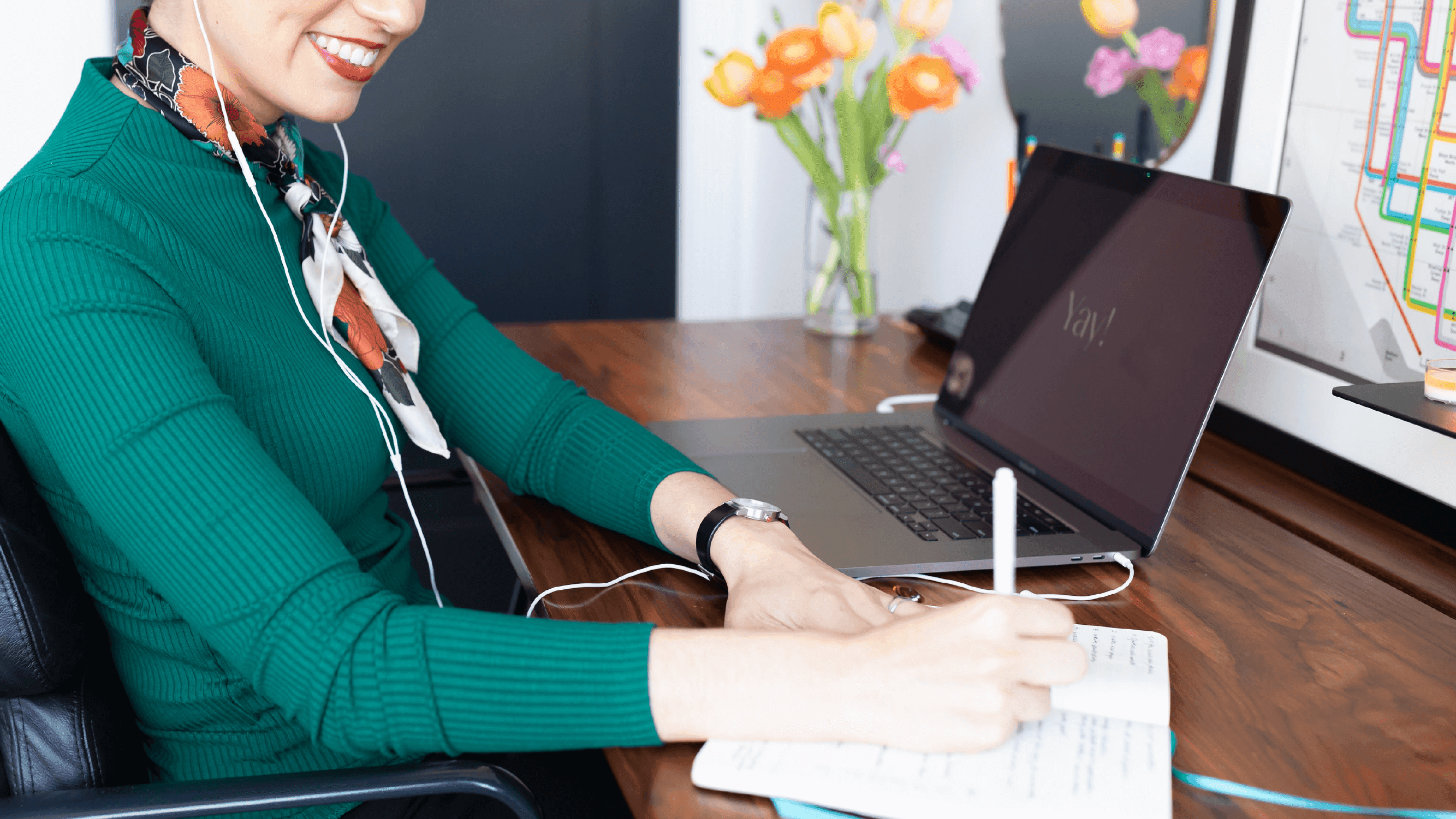 brand designer writing and smiling