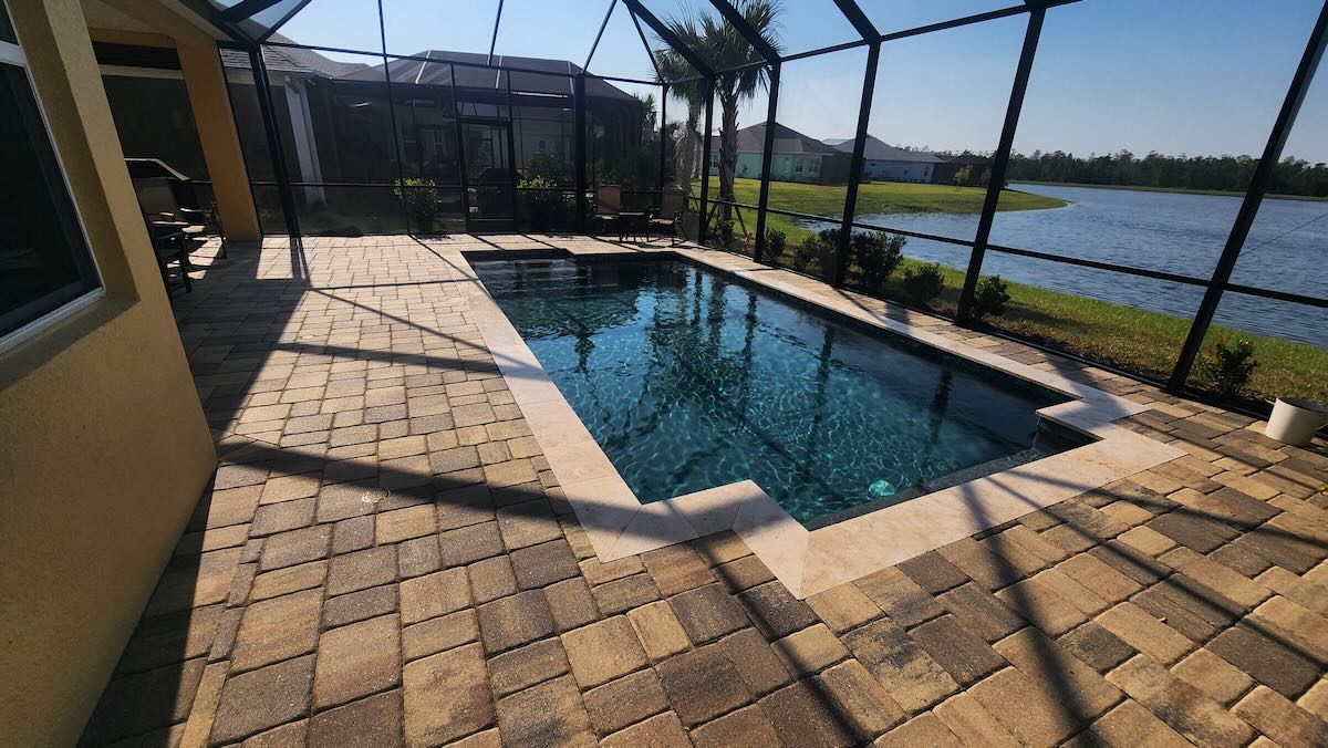 Paver pool patio in Central Florida prepared for cleaning and sealing