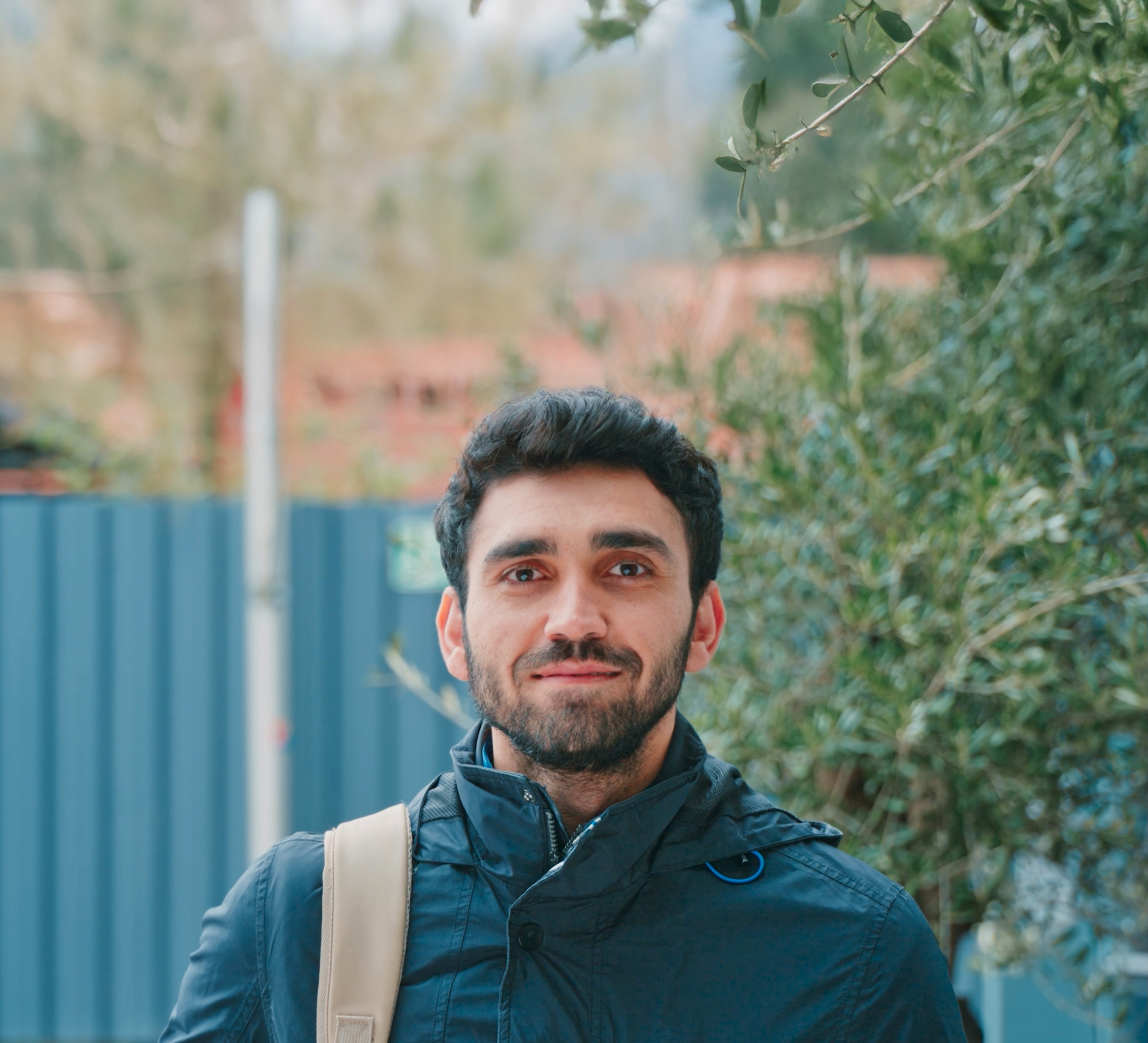 Portrait of the campaign protagonist looking into the camera, symbolizing empathy and connection.