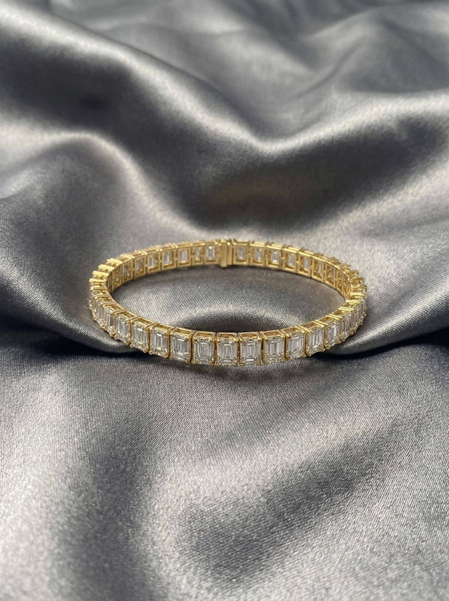 Emerald Cut Tennis Bracelet — jewellery product photograph