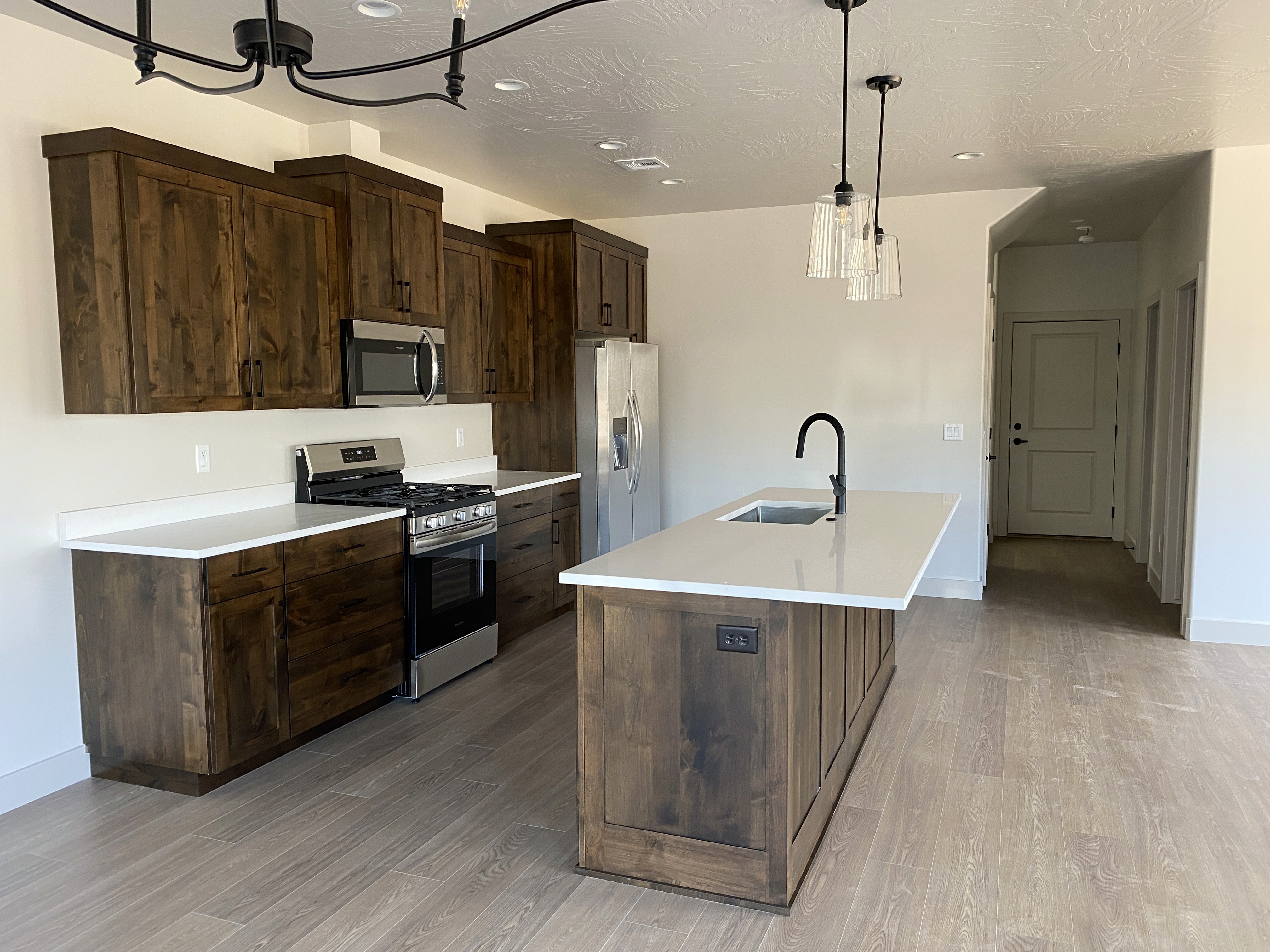 Kitchen in a Southern Utah duplex with modern cabinetry and efficient layout