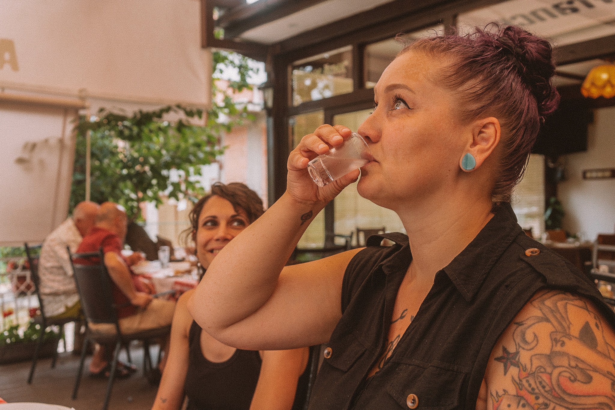 woman drinking rakija