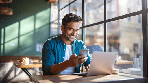 Man checking his phone with a message about ITR refund credited, alongside a breakdown of salary details.