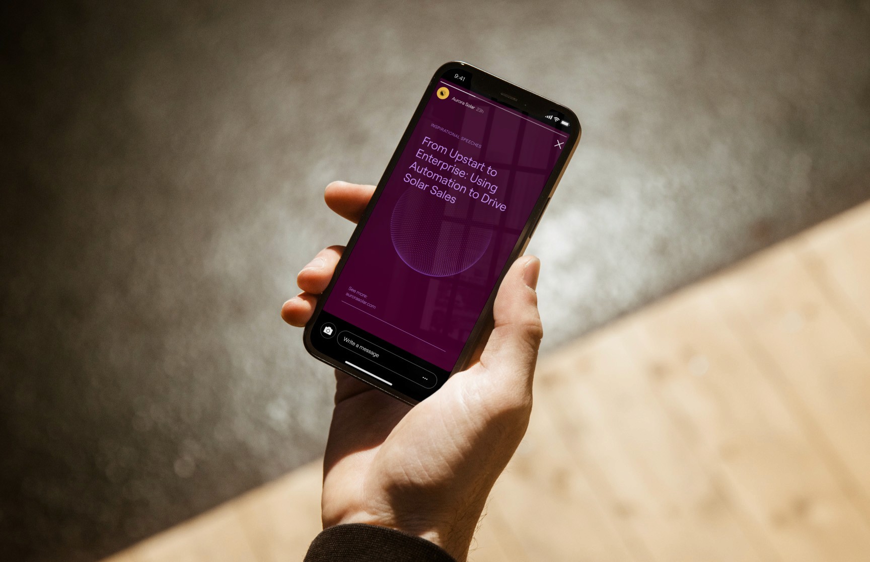 A hand holds a smartphone displaying a dark purple social media graphic titled "From Upstart to Enterprise: Using Automation to Drive Solar Sales." This demonstrates the studio’s expertise in content strategy and digital advertising for the tech sector.