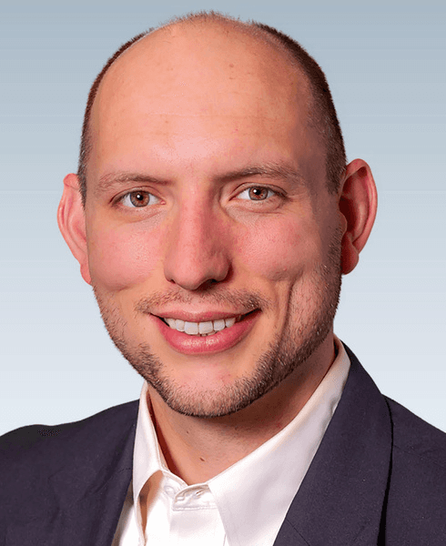 Photo of a white midle man age, Jesse Proctor - Chief Growth Officer and co-author of the white paper "Generational Transitions for Trucking Business Owners published on the Beyond Trucks website