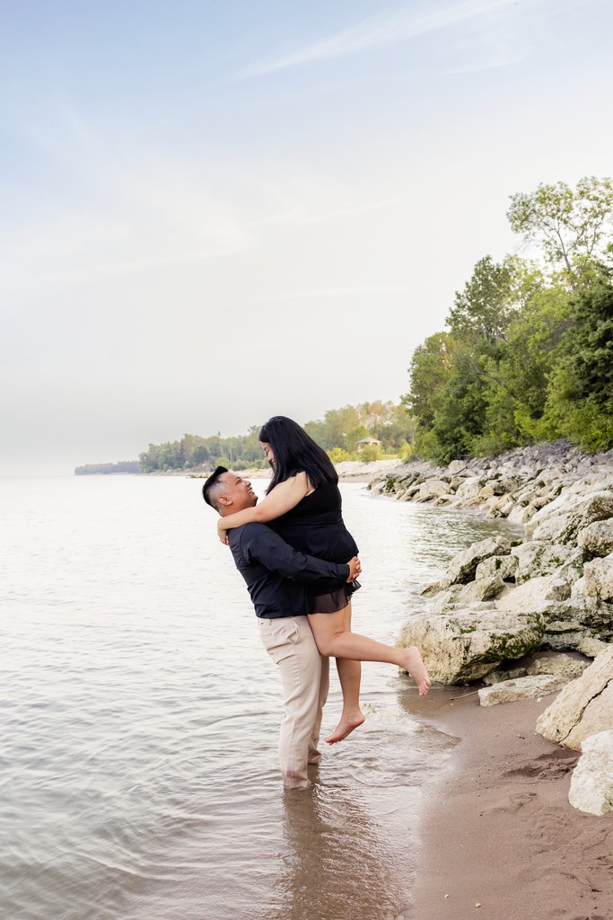 Family enjoying some quality time together at a scenic lake during a family photoshoot