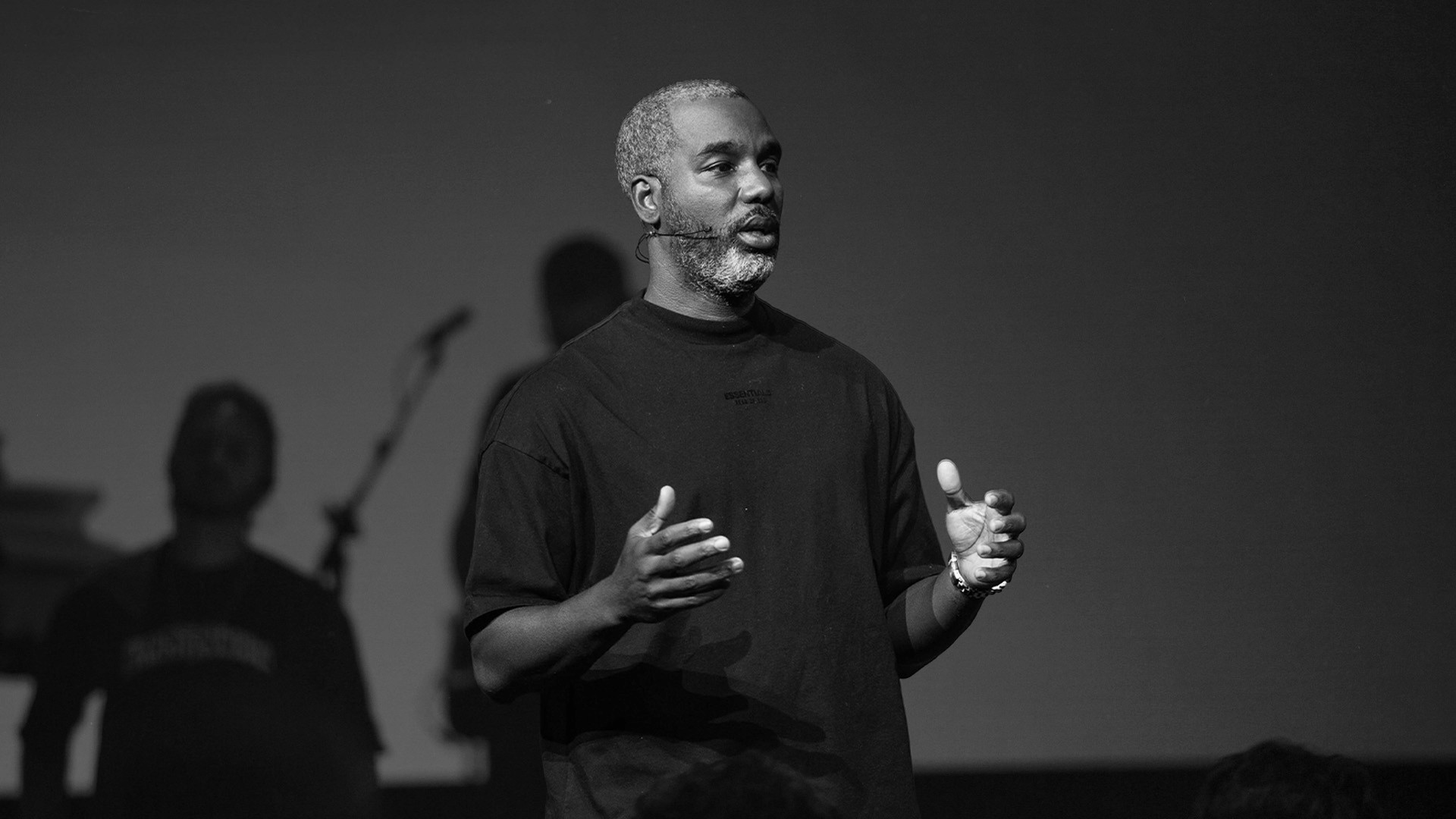 two people looking at a tablet and smiling