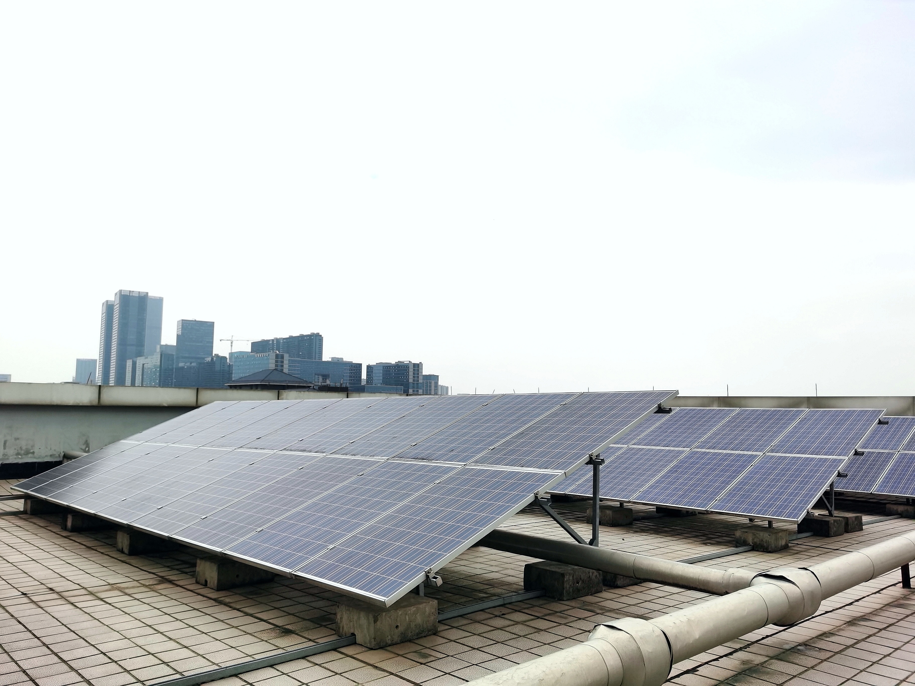 Solar panels overlooking a city
