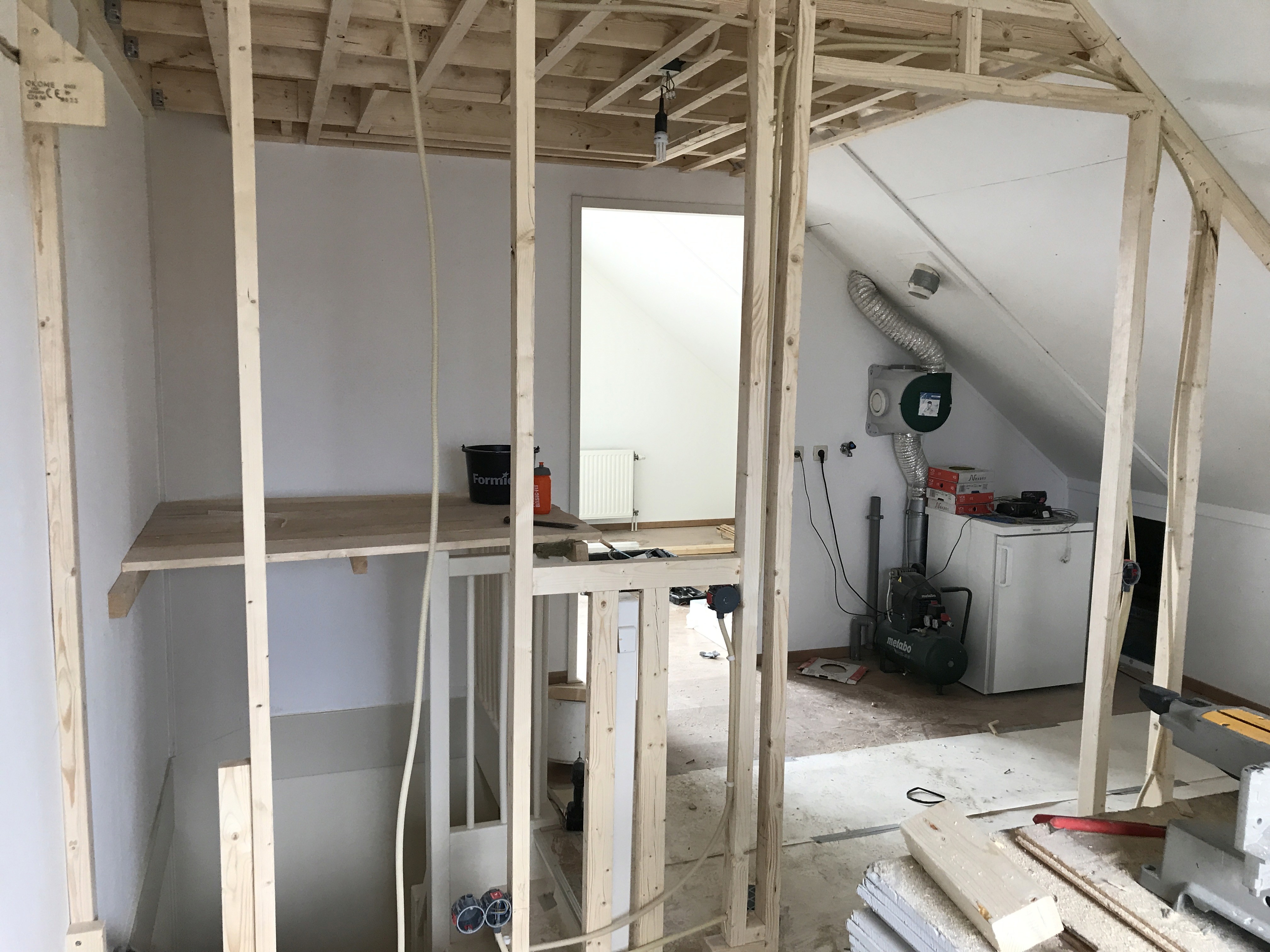 husband and wife working happily on a laptop