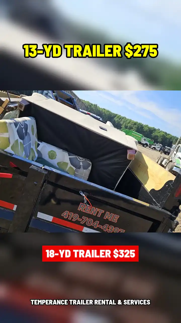 Dumpster trailer dumping a load