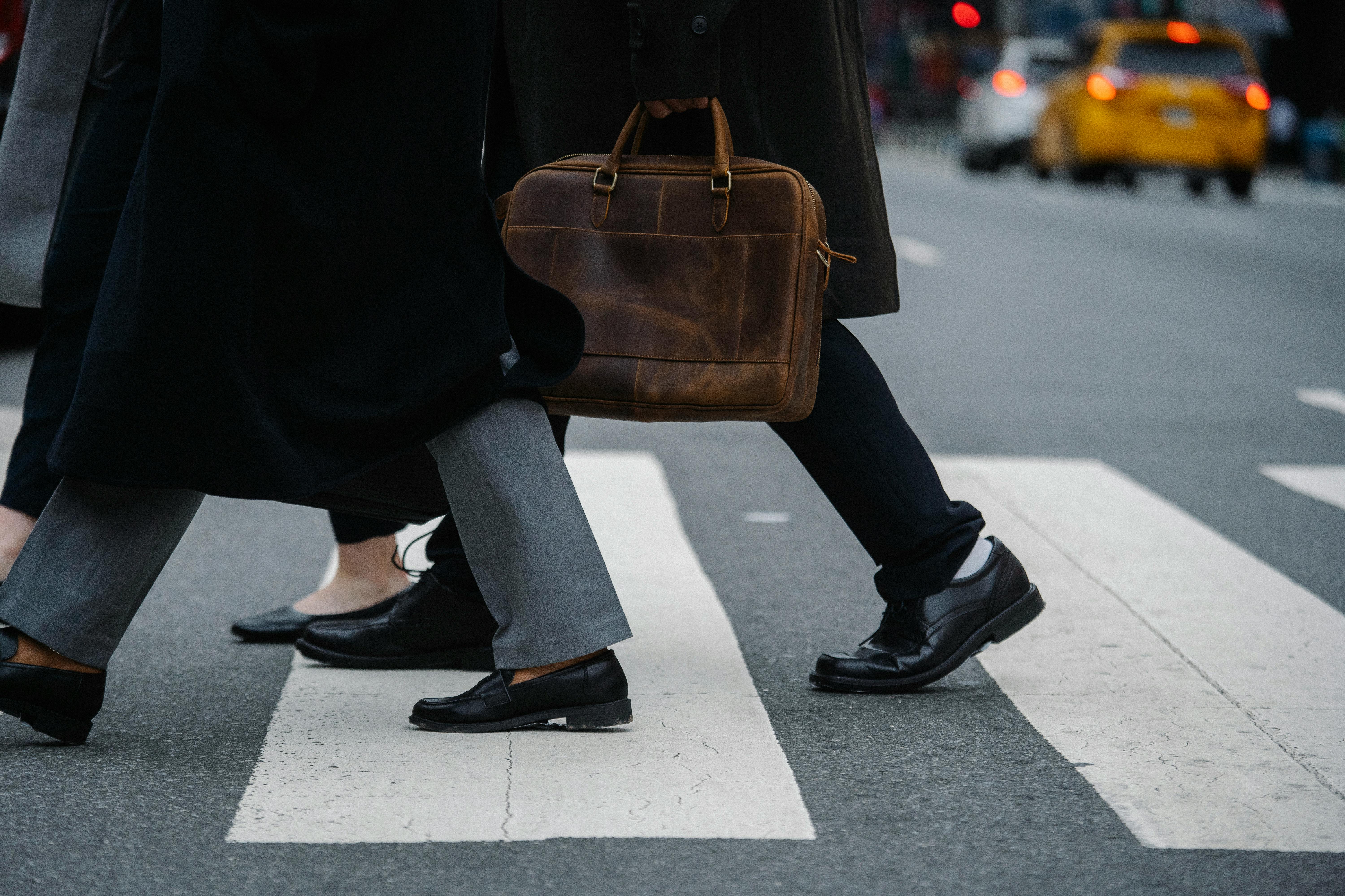 side-view-of-crop-unrecognizable-coworkers-in-formal-wear-with-leather-briefcase - sora-shimazaki (pexels)
