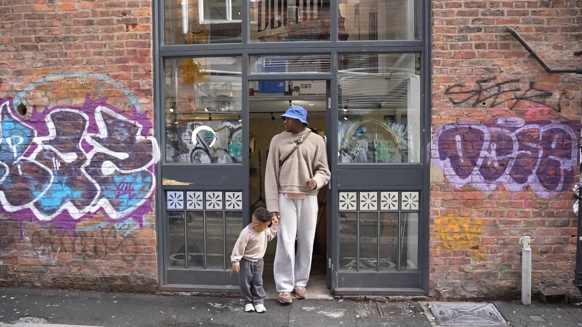 Image of Jefe standing outside the shop
