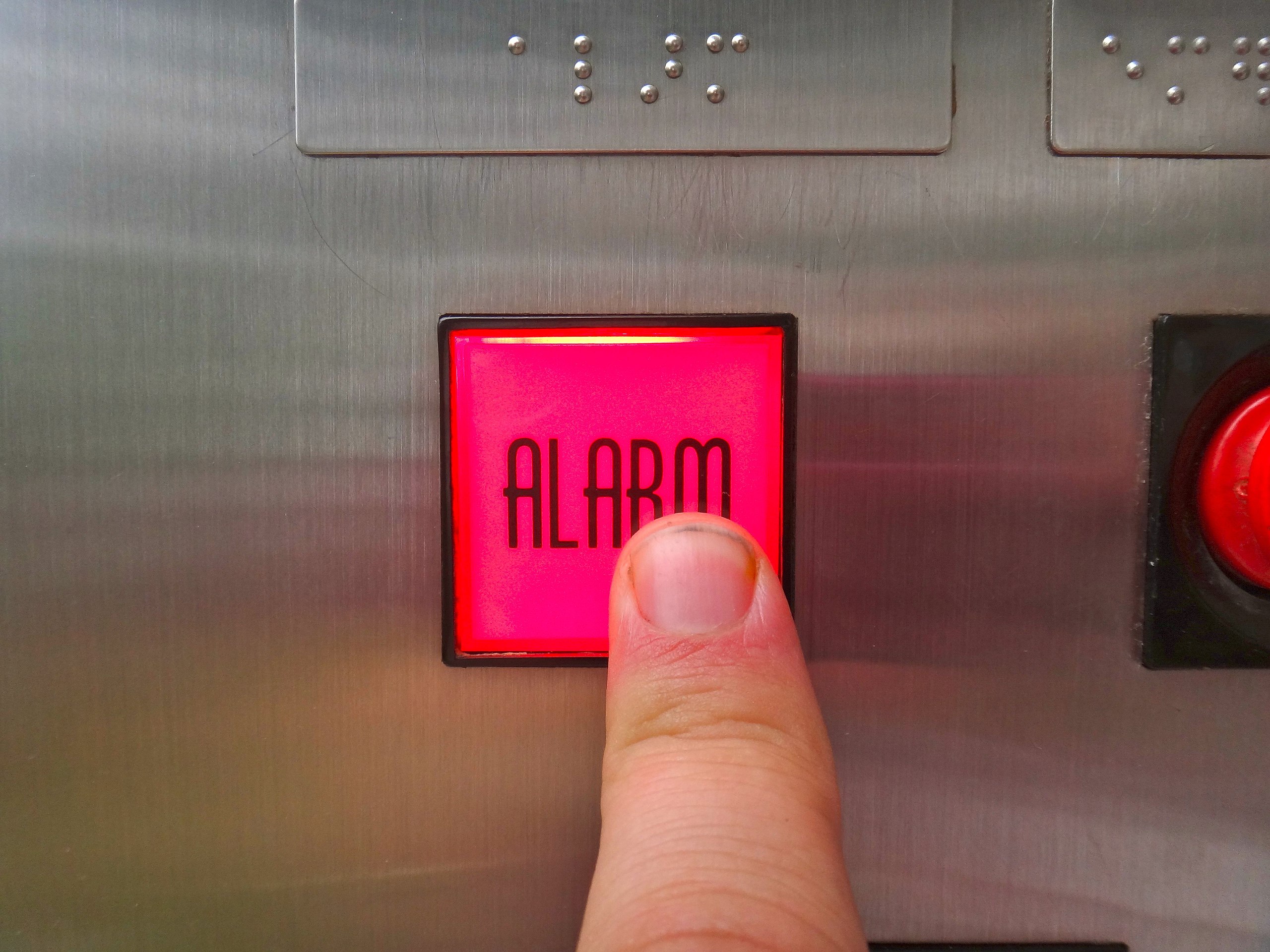 Emergency alarm button and light