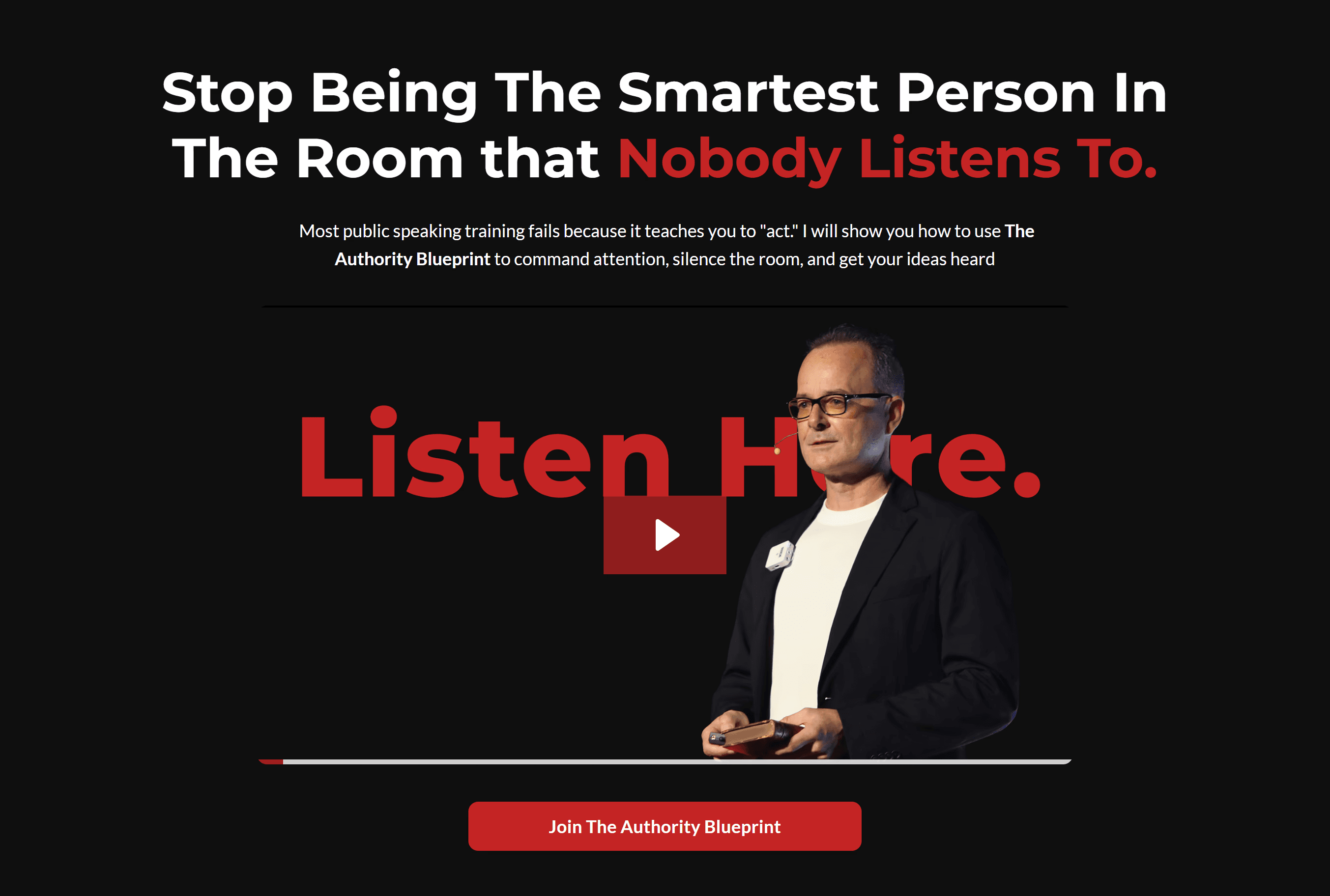 Portrait of a woman with long brown hair and green eyes