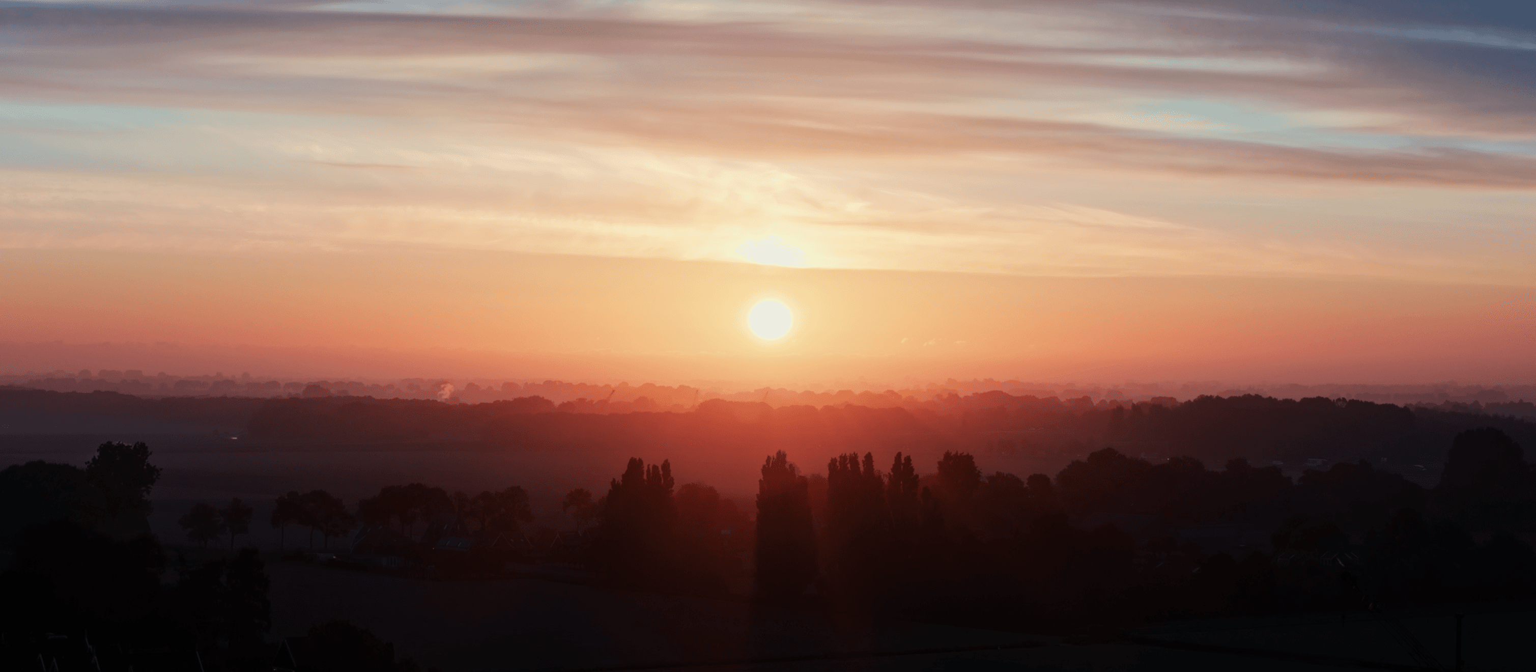 Drone shot of a running track at night