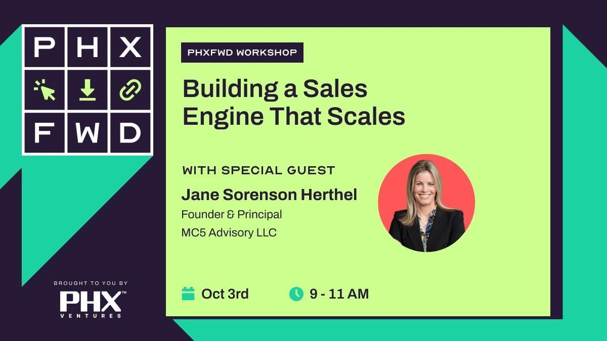 a black and white living room with a large tv