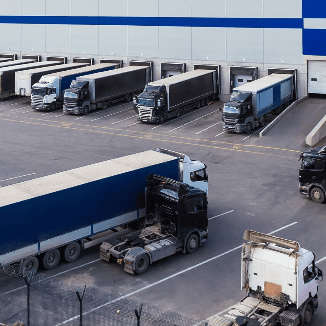 Real-time yard management showing multiple trucks at dock doors optimizing throughput.