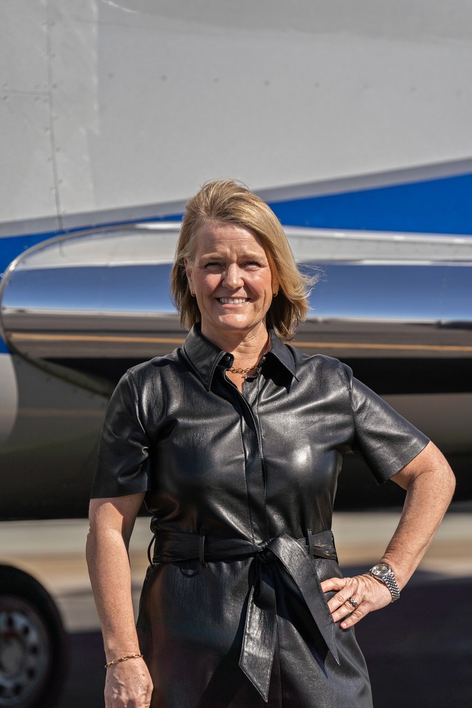 person sitting in a chair in front of a man